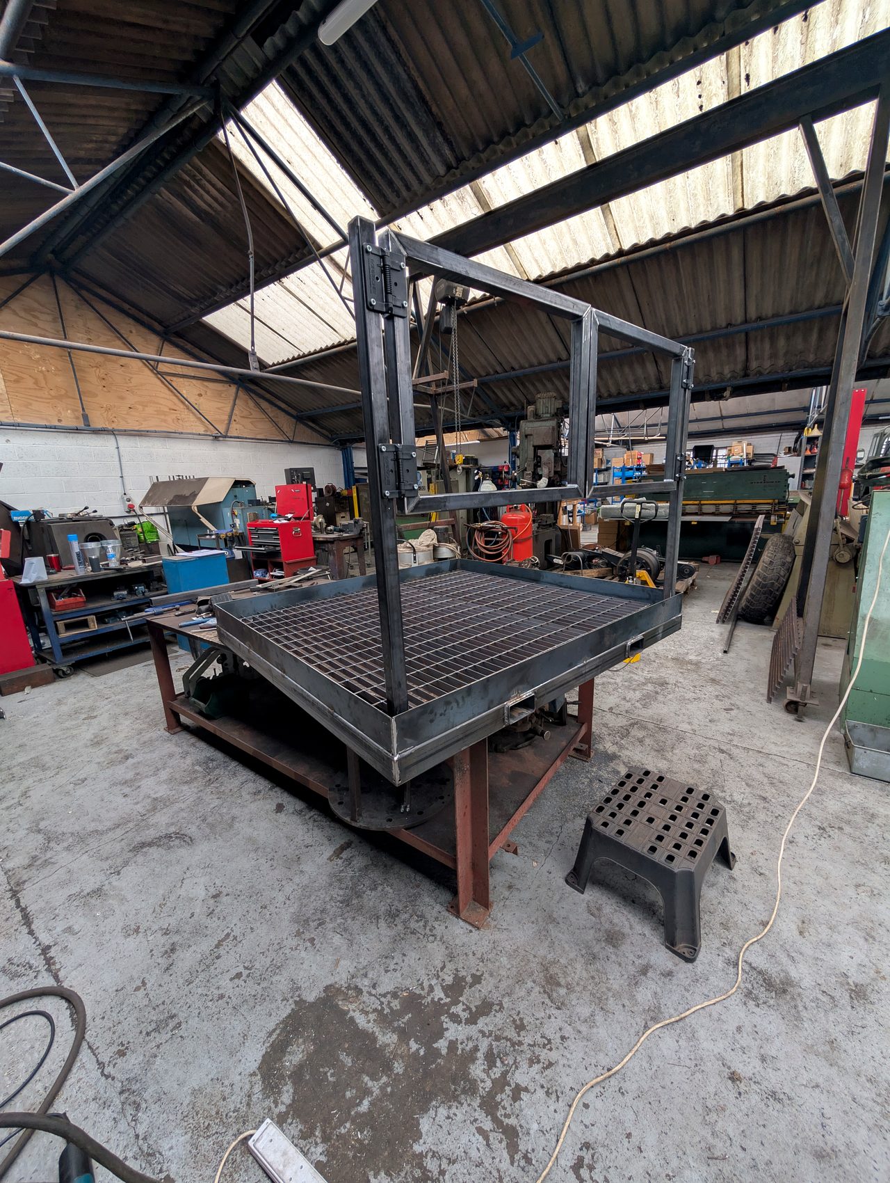 Large fabricated steel platform frame in workshop