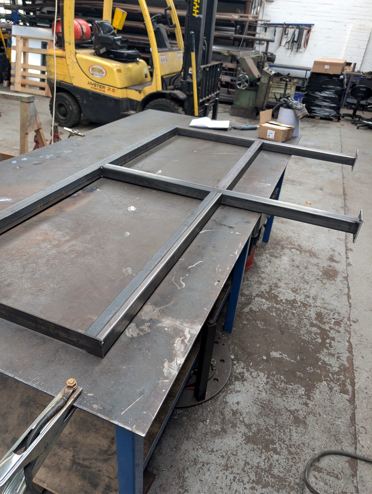 Flat metal frame and sheet fabrication on a bench